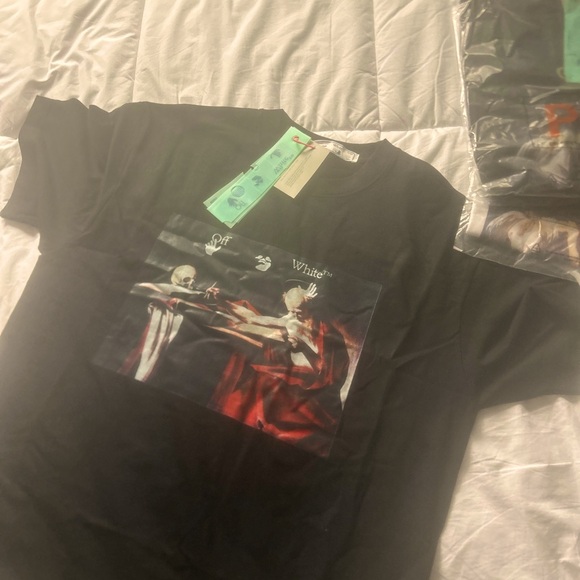 Off white shirt i found 2 of them at a garage sell but i want to keep one